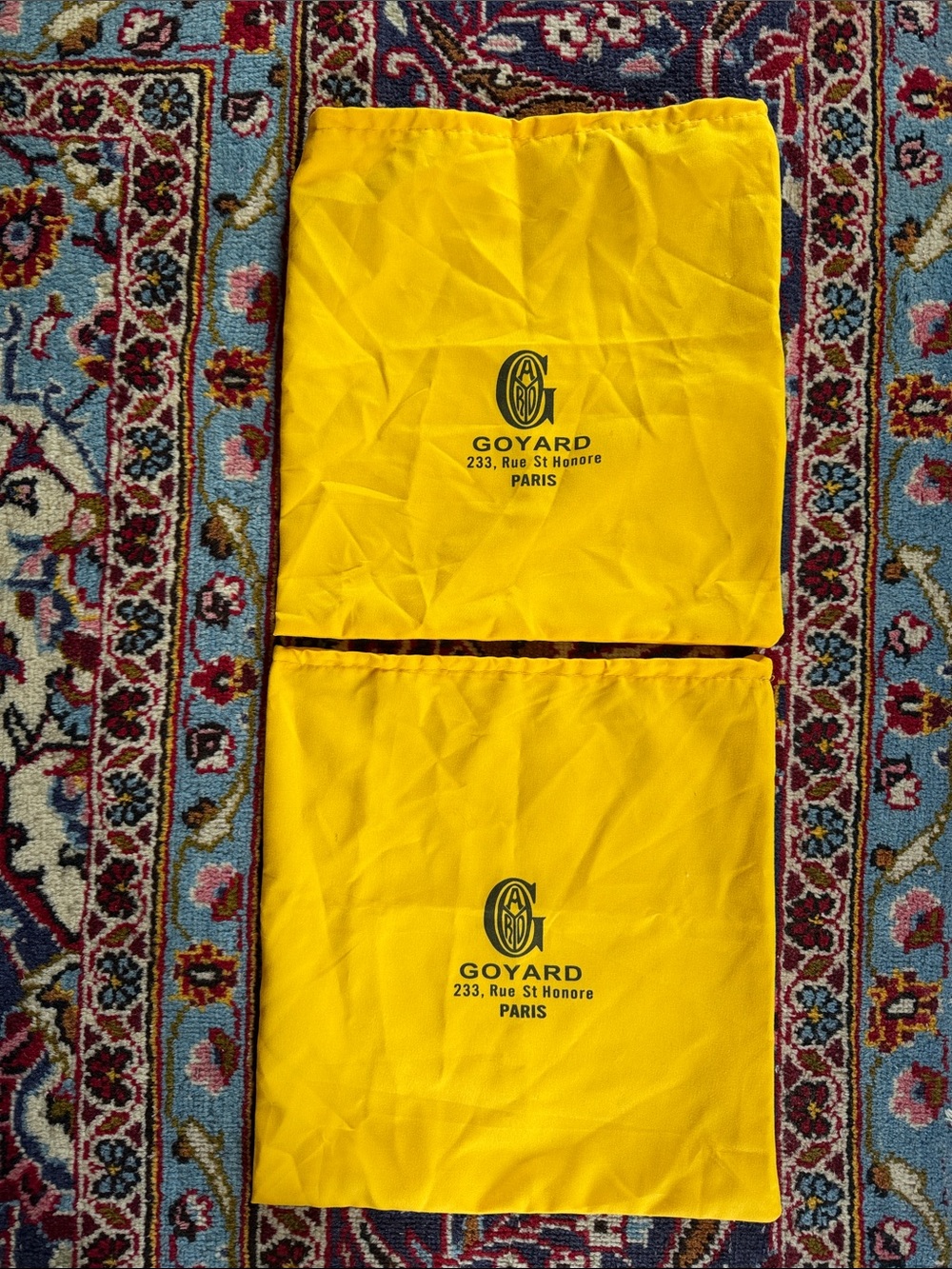 Two Goyard dust bags